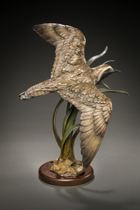 Flying Golden Plover by Raymond Gibby